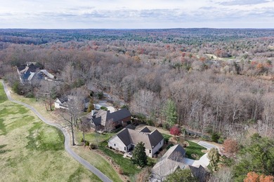 An exceptional all-brick custom residence, gracefully positioned on Heatherhurst Golf Course in Tennessee - for sale on GolfHomes.com, golf home, golf lot