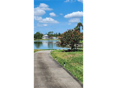 Beautiful home ideally situated 3 homes away from the community on Sabal Springs Golf and Racquet Club in Florida - for sale on GolfHomes.com, golf home, golf lot