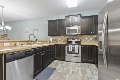 Welcome to this FIRST FLOOR 2-bedroom, 2-bath condo located in on Barefoot Resort and Golf Club  in South Carolina - for sale on GolfHomes.com, golf home, golf lot