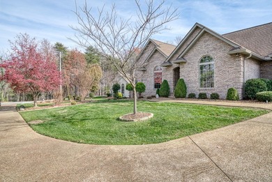 An exceptional all-brick custom residence, gracefully positioned on Heatherhurst Golf Course in Tennessee - for sale on GolfHomes.com, golf home, golf lot