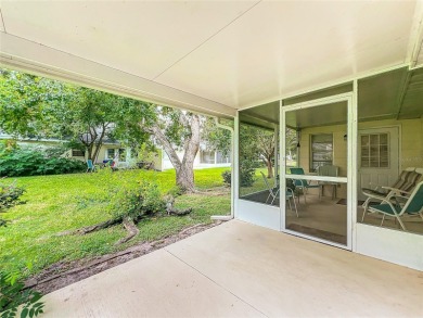 Welcome to this beautifully maintained 2-bedroom, 2-bath end on On Top of the World Golf Course in Florida - for sale on GolfHomes.com, golf home, golf lot