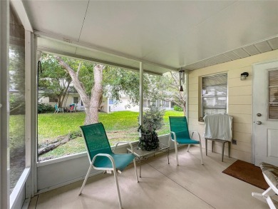 Welcome to this beautifully maintained 2-bedroom, 2-bath end on On Top of the World Golf Course in Florida - for sale on GolfHomes.com, golf home, golf lot