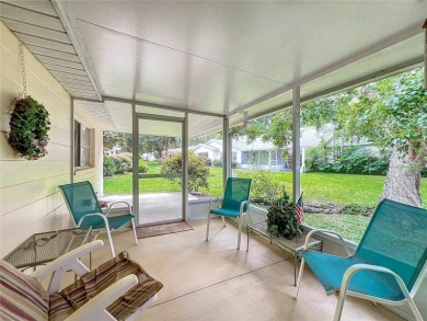 Welcome to this beautifully maintained 2-bedroom, 2-bath end on On Top of the World Golf Course in Florida - for sale on GolfHomes.com, golf home, golf lot