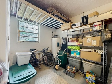 Welcome to this beautifully maintained 2-bedroom, 2-bath end on On Top of the World Golf Course in Florida - for sale on GolfHomes.com, golf home, golf lot
