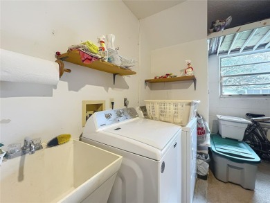 Welcome to this beautifully maintained 2-bedroom, 2-bath end on On Top of the World Golf Course in Florida - for sale on GolfHomes.com, golf home, golf lot