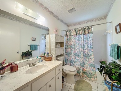 Welcome to this beautifully maintained 2-bedroom, 2-bath end on On Top of the World Golf Course in Florida - for sale on GolfHomes.com, golf home, golf lot