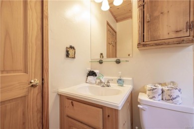 Nestled among the trees in Moonridge, this charming cabin is on Big Bear Mountain Ski and Golf Resort in California - for sale on GolfHomes.com, golf home, golf lot