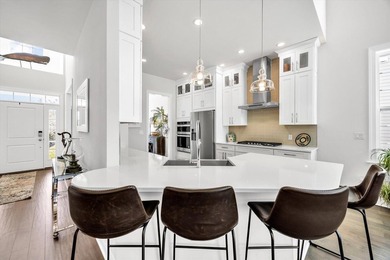 Overlooking the 18th hole of the Jones Golf Course, this elegant on Pinehills Golf Club  in Massachusetts - for sale on GolfHomes.com, golf home, golf lot