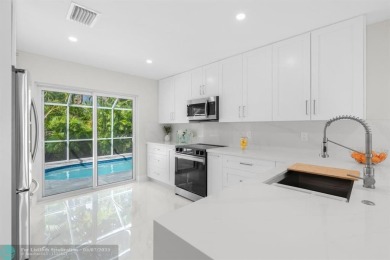 Stunning Updated Pool Home in West Boca - Seller is Offering to on Boca Greens Country Club in Florida - for sale on GolfHomes.com, golf home, golf lot