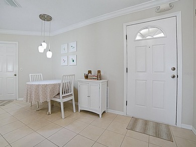 WARM AND WELCOMING this Beauregard villa is nestled in Greenwood on Oakleigh Executive Golf Course in Florida - for sale on GolfHomes.com, golf home, golf lot