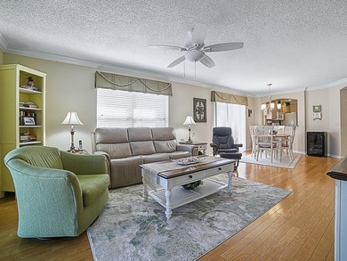 WARM AND WELCOMING this Beauregard villa is nestled in Greenwood on Oakleigh Executive Golf Course in Florida - for sale on GolfHomes.com, golf home, golf lot