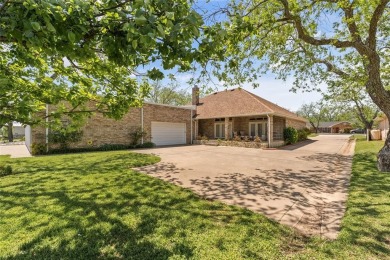 Right off of the airstrip. Discover the perfect blend of luxury on Pecan Plantation Country Club in Texas - for sale on GolfHomes.com, golf home, golf lot