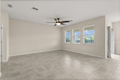**This property qualifies for a closing cost credit up to $5,700 on ChampionsGate Golf Resort in Florida - for sale on GolfHomes.com, golf home, golf lot