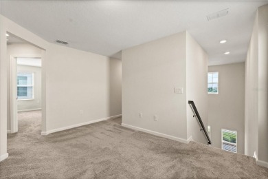 **This property qualifies for a closing cost credit up to $5,700 on ChampionsGate Golf Resort in Florida - for sale on GolfHomes.com, golf home, golf lot