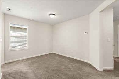 **This property qualifies for a closing cost credit up to $5,700 on ChampionsGate Golf Resort in Florida - for sale on GolfHomes.com, golf home, golf lot