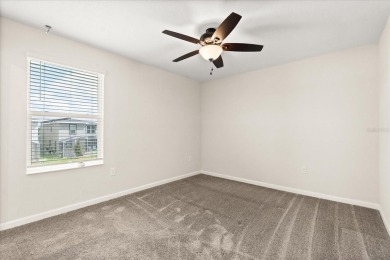 **This property qualifies for a closing cost credit up to $5,700 on ChampionsGate Golf Resort in Florida - for sale on GolfHomes.com, golf home, golf lot