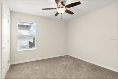 **This property qualifies for a closing cost credit up to $5,700 on ChampionsGate Golf Resort in Florida - for sale on GolfHomes.com, golf home, golf lot