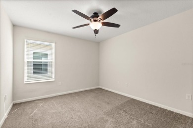 **This property qualifies for a closing cost credit up to $5,700 on ChampionsGate Golf Resort in Florida - for sale on GolfHomes.com, golf home, golf lot