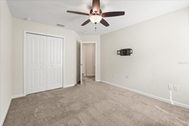 **This property qualifies for a closing cost credit up to $5,700 on ChampionsGate Golf Resort in Florida - for sale on GolfHomes.com, golf home, golf lot