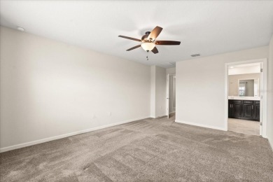 **This property qualifies for a closing cost credit up to $5,700 on ChampionsGate Golf Resort in Florida - for sale on GolfHomes.com, golf home, golf lot