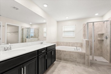 **This property qualifies for a closing cost credit up to $5,700 on ChampionsGate Golf Resort in Florida - for sale on GolfHomes.com, golf home, golf lot