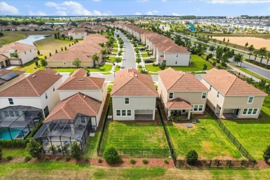 **This property qualifies for a closing cost credit up to $5,700 on ChampionsGate Golf Resort in Florida - for sale on GolfHomes.com, golf home, golf lot