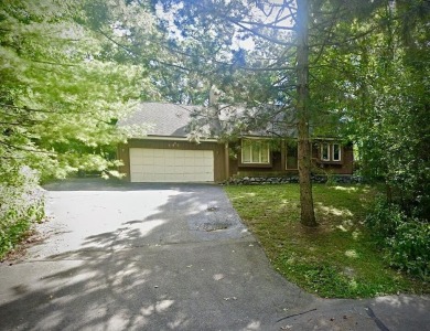 347 Church Drive, a 3-bedroom, 2-bath home with a 2-car attached on Country Club Estates Golf Course in Wisconsin - for sale on GolfHomes.com, golf home, golf lot