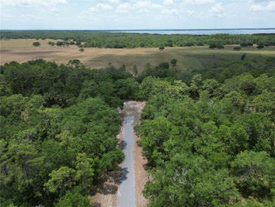 Located in a beautiful gated community, this property offers on Indian Lake Estates Golf and Country Club in Florida - for sale on GolfHomes.com, golf home, golf lot