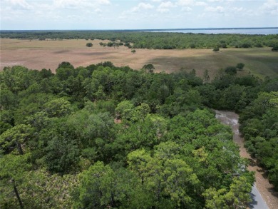 Located in a beautiful gated community, this property offers on Indian Lake Estates Golf and Country Club in Florida - for sale on GolfHomes.com, golf home, golf lot