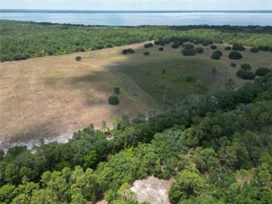 Located in a beautiful gated community, this property offers on Indian Lake Estates Golf and Country Club in Florida - for sale on GolfHomes.com, golf home, golf lot