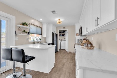 Welcome to this fully updated end unit model with water views on Leisure Village West Assoc. in New Jersey - for sale on GolfHomes.com, golf home, golf lot