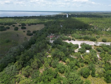 Located in a beautiful gated community, this property offers on Indian Lake Estates Golf and Country Club in Florida - for sale on GolfHomes.com, golf home, golf lot