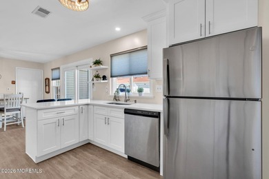 Welcome to this fully updated end unit model with water views on Leisure Village West Assoc. in New Jersey - for sale on GolfHomes.com, golf home, golf lot