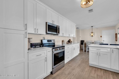 Welcome to this fully updated end unit model with water views on Leisure Village West Assoc. in New Jersey - for sale on GolfHomes.com, golf home, golf lot