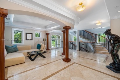 Grand 3-story gated home on prestigious lower North Bay Road on Miami Beach Golf Club in Florida - for sale on GolfHomes.com, golf home, golf lot