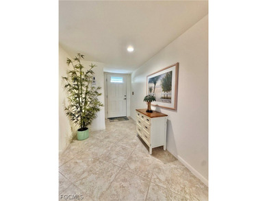 Located in the highly sought-after Glades Country Club in on The Glades Golf and Country Club in Florida - for sale on GolfHomes.com, golf home, golf lot