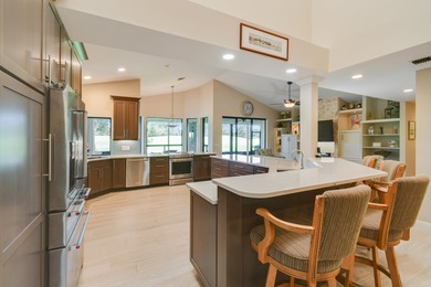 Tucked along the 17th hole of the River Ridge Course, this on Harbour Ridge Yacht and Country Club in Florida - for sale on GolfHomes.com, golf home, golf lot