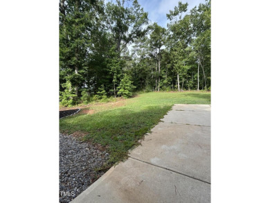 Welcome to 1119 Sagamore Drive, a stunning custom waterfront on River Golf and County Club at Lake Royale in North Carolina - for sale on GolfHomes.com, golf home, golf lot