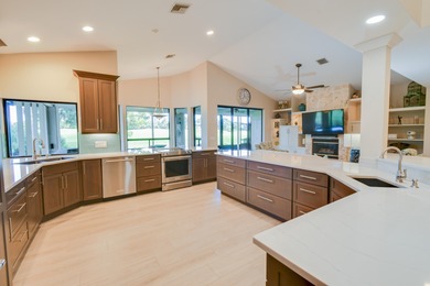 Tucked along the 17th hole of the River Ridge Course, this on Harbour Ridge Yacht and Country Club in Florida - for sale on GolfHomes.com, golf home, golf lot