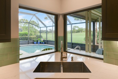 Tucked along the 17th hole of the River Ridge Course, this on Harbour Ridge Yacht and Country Club in Florida - for sale on GolfHomes.com, golf home, golf lot