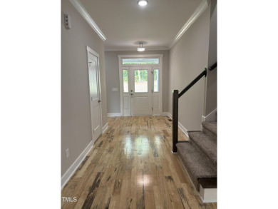 Welcome to 1119 Sagamore Drive, a stunning custom waterfront on River Golf and County Club at Lake Royale in North Carolina - for sale on GolfHomes.com, golf home, golf lot