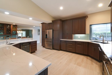 Tucked along the 17th hole of the River Ridge Course, this on Harbour Ridge Yacht and Country Club in Florida - for sale on GolfHomes.com, golf home, golf lot