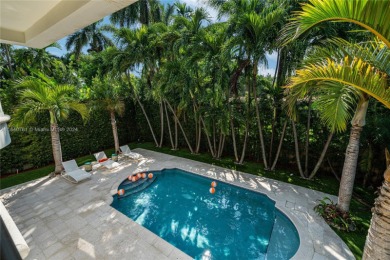 Grand 3-story gated home on prestigious lower North Bay Road on Miami Beach Golf Club in Florida - for sale on GolfHomes.com, golf home, golf lot