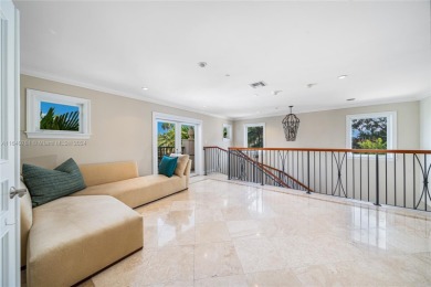 Grand 3-story gated home on prestigious lower North Bay Road on Miami Beach Golf Club in Florida - for sale on GolfHomes.com, golf home, golf lot