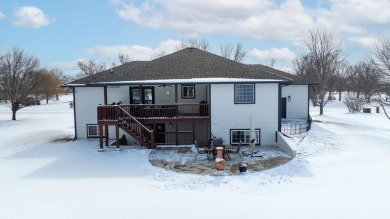 This stunning 4-bedroom, 3-bathroom ranch home with a 3-car on Pine Bay Golf Course in Kansas - for sale on GolfHomes.com, golf home, golf lot