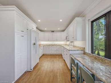 Immerse yourself in golf course living in this preferred on Wilderness Country Club in Florida - for sale on GolfHomes.com, golf home, golf lot