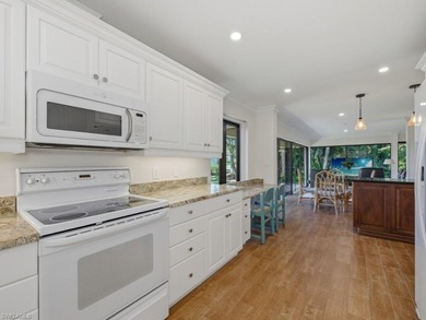 Immerse yourself in golf course living in this preferred on Wilderness Country Club in Florida - for sale on GolfHomes.com, golf home, golf lot