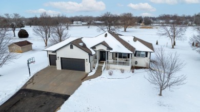 This stunning 4-bedroom, 3-bathroom ranch home with a 3-car on Pine Bay Golf Course in Kansas - for sale on GolfHomes.com, golf home, golf lot