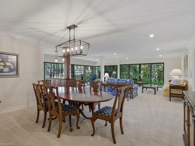 Immerse yourself in golf course living in this preferred on Wilderness Country Club in Florida - for sale on GolfHomes.com, golf home, golf lot