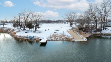 This stunning 4-bedroom, 3-bathroom ranch home with a 3-car on Pine Bay Golf Course in Kansas - for sale on GolfHomes.com, golf home, golf lot